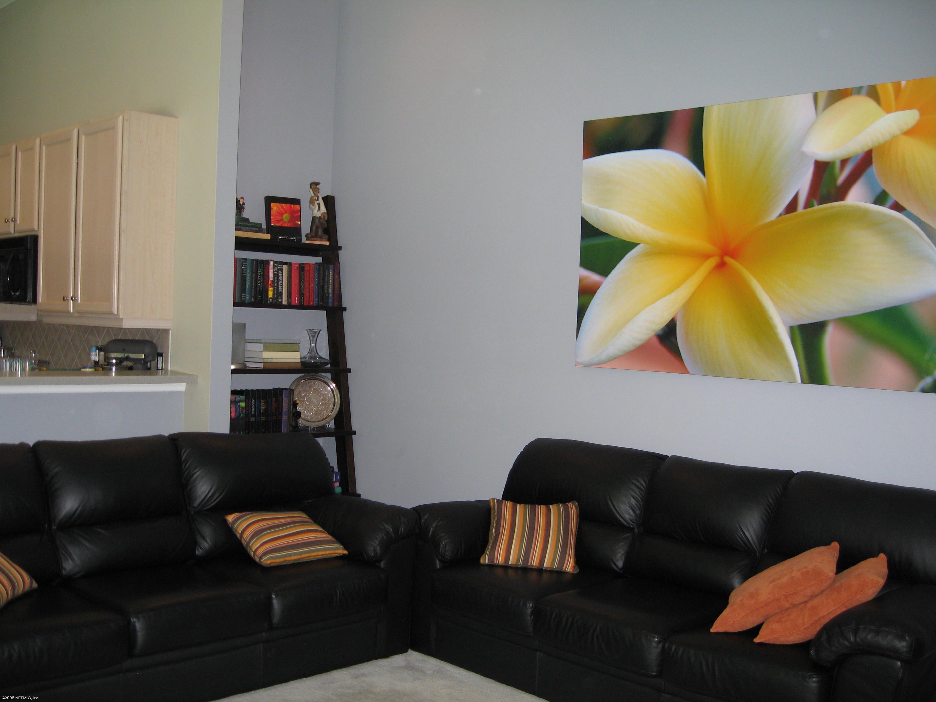 753 Mill Stream Road Ponte Vedra Beach, FL 32082 - Photo 5 of 16 a living room with furniture and a lamp