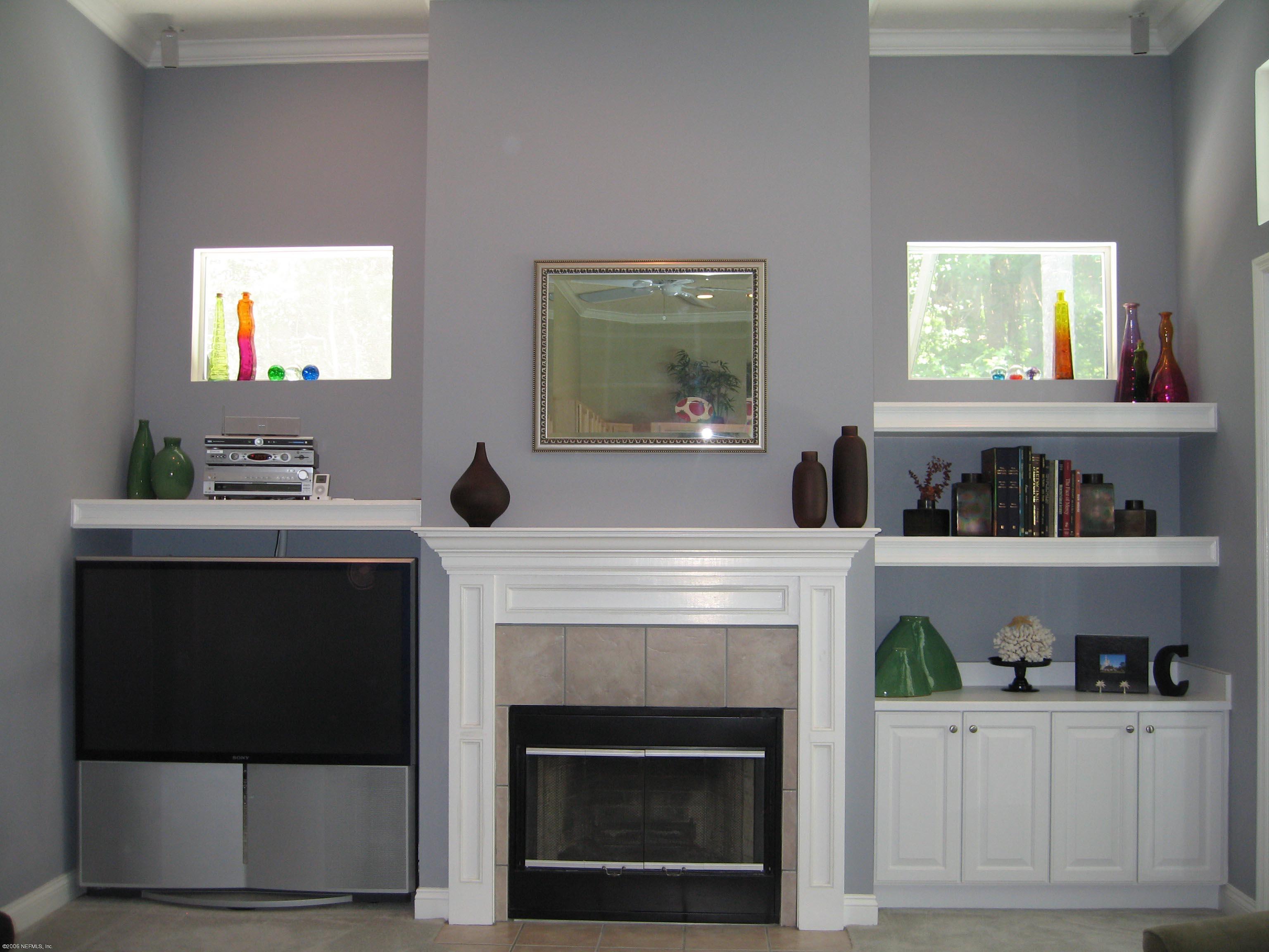 753 Mill Stream Road Ponte Vedra Beach, FL 32082 - Photo 6 of 16 a kitchen with cabinets and a stove