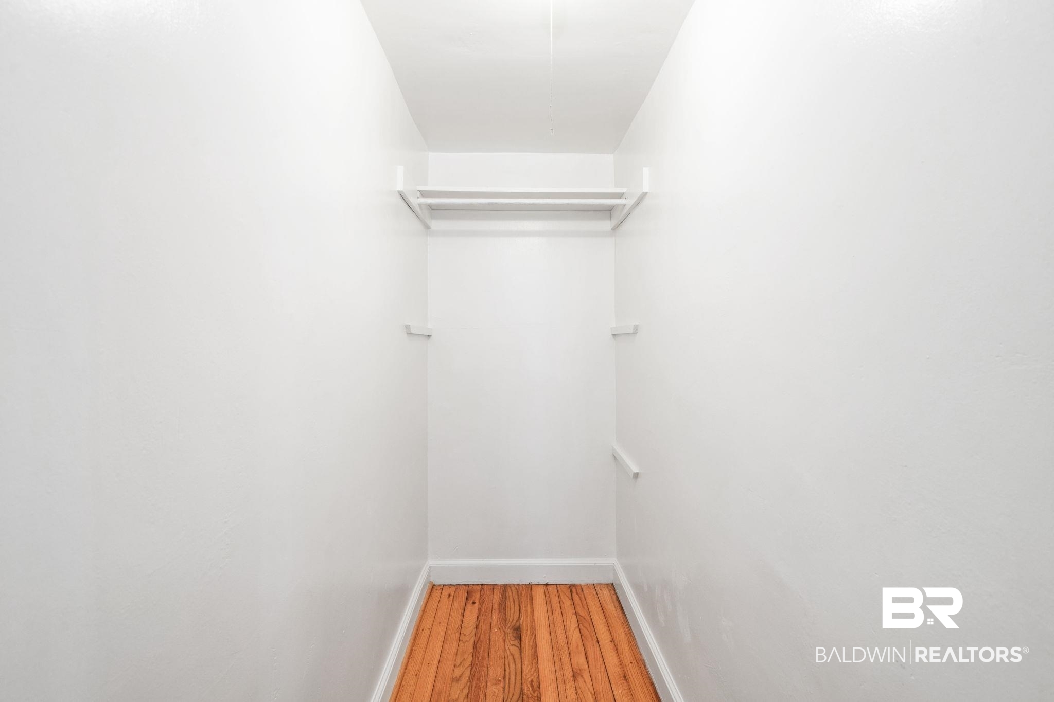 1707 Church Street Mobile, AL 36604 - Photo 27 of 43 Walk in closet with wood finished floors