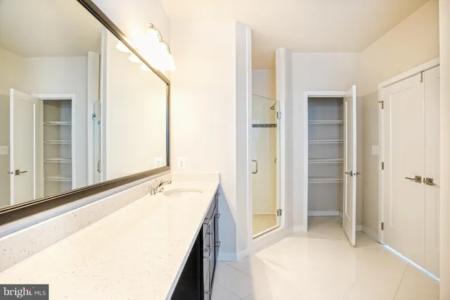 a bathroom with a bathtub and a sink