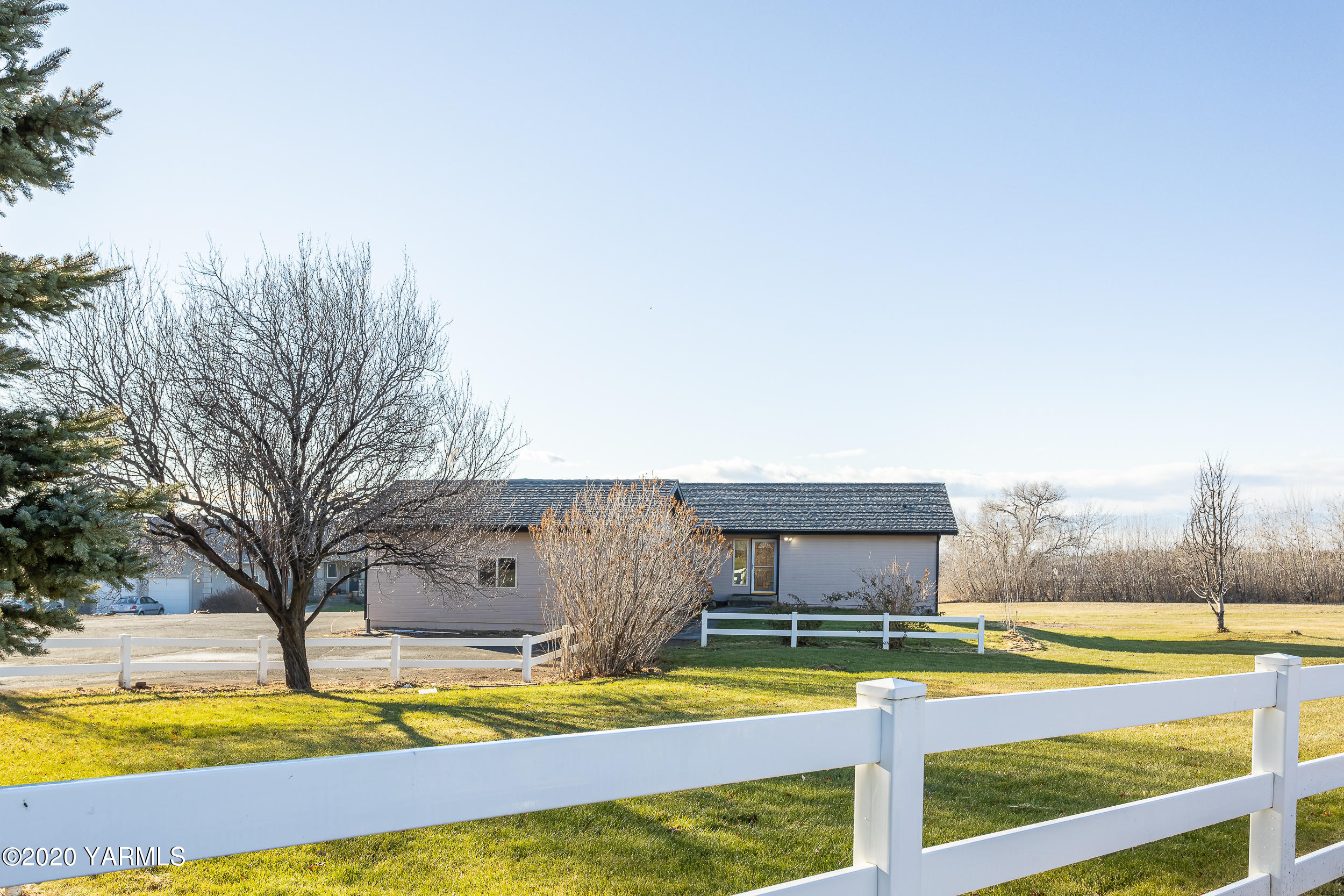 9800 Bittner Road Yakima, WA 98901 - Photo 2 of 45 a view of a swimming pool with an outdoor space and seating area