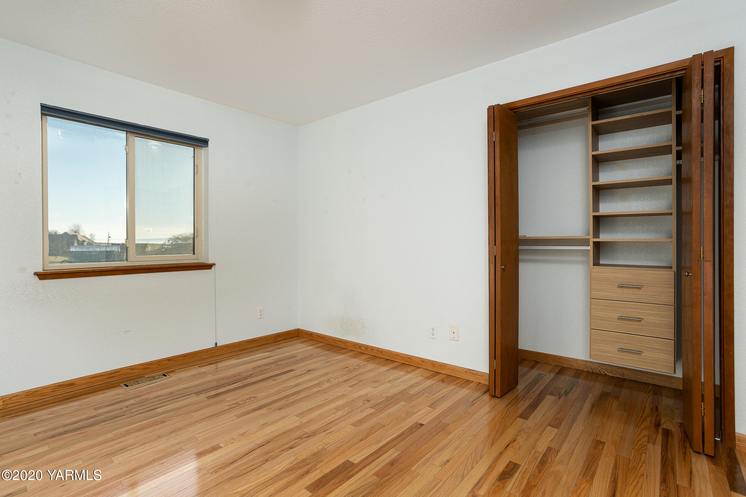 9800 Bittner Road Yakima, WA 98901 - Photo 18 of 45 a view of empty room with wooden floor