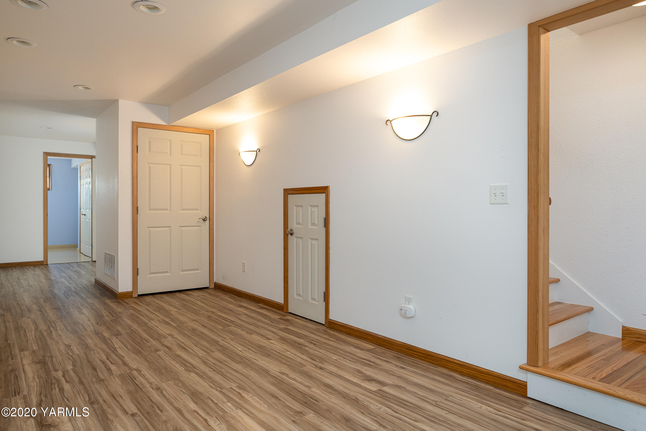 9800 Bittner Road Yakima, WA 98901 - Photo 24 of 45 a view of an empty room with wooden floor and a window
