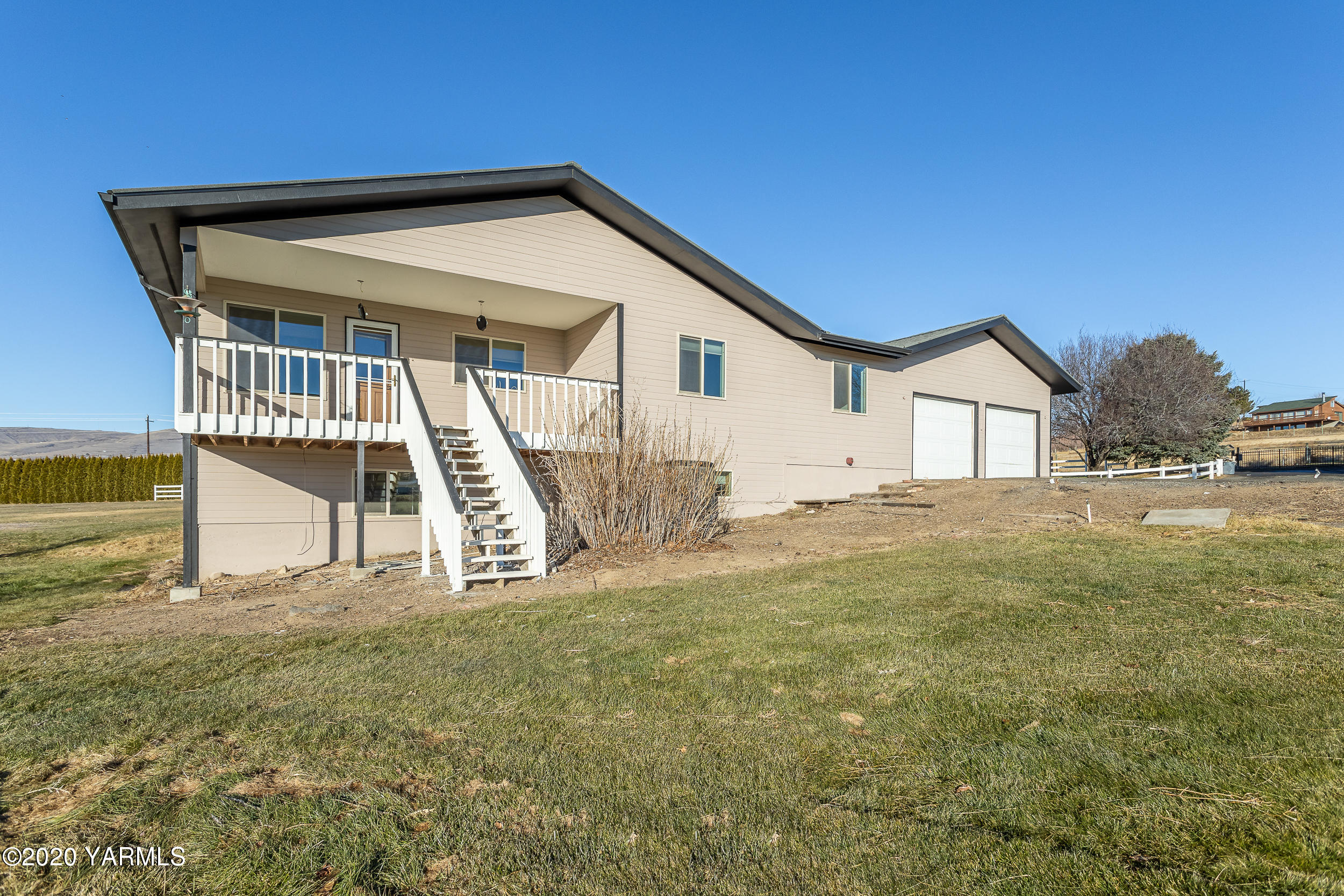 9800 Bittner Road Yakima, WA 98901 - Photo 34 of 45 a view of house with backyard and deck
