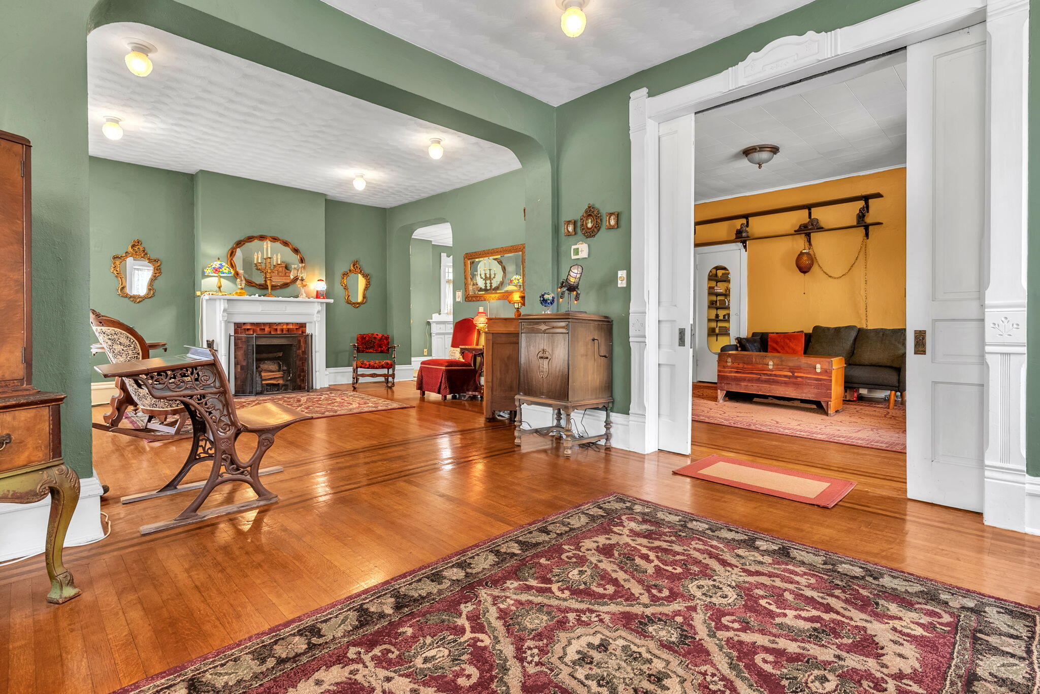 623 West Milroy Avenue Rensselaer, IN 47978 - Photo 11 of 58 a living room with furniture and a fireplace