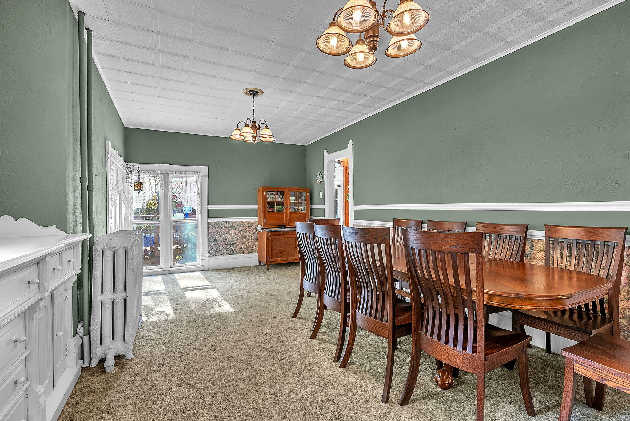 623 West Milroy Avenue Rensselaer, IN 47978 - Photo 16 of 58 a view of a dining room with furniture window and outside view