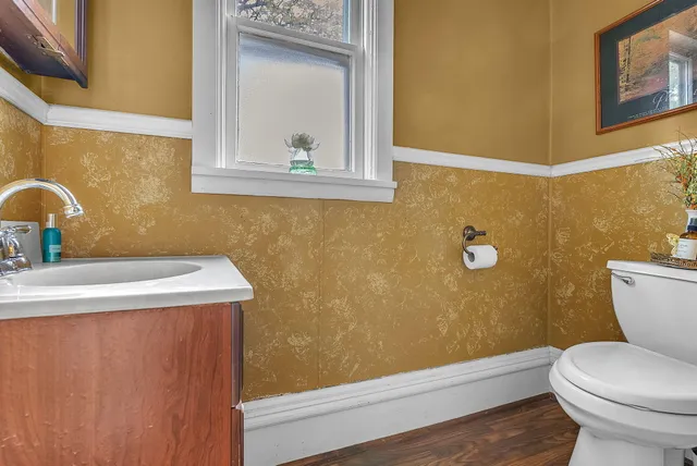 a kitchen with stainless steel appliances a sink window and a counter top space