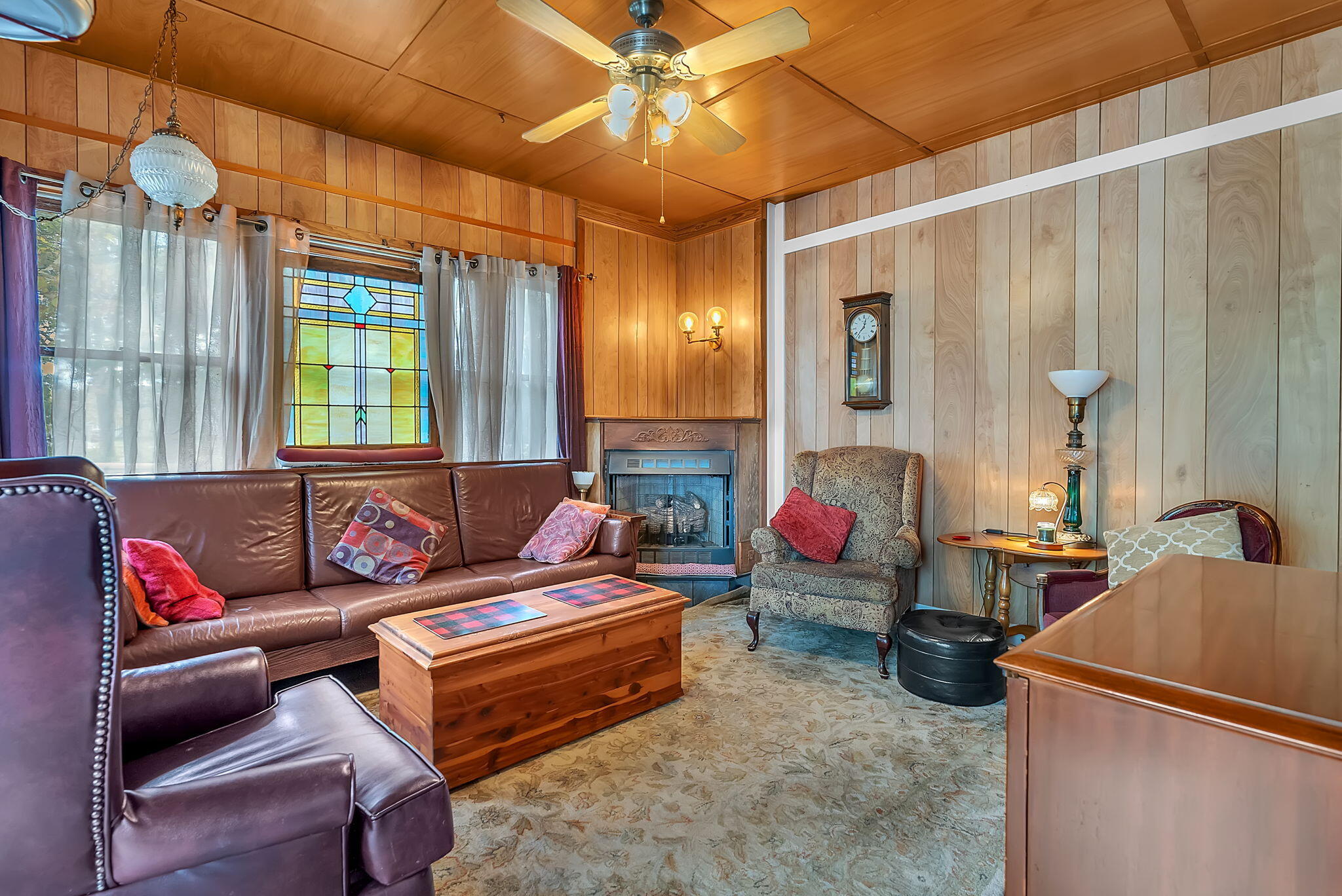 623 West Milroy Avenue Rensselaer, IN 47978 - Photo 26 of 64 a living room with furniture a window and a fireplace