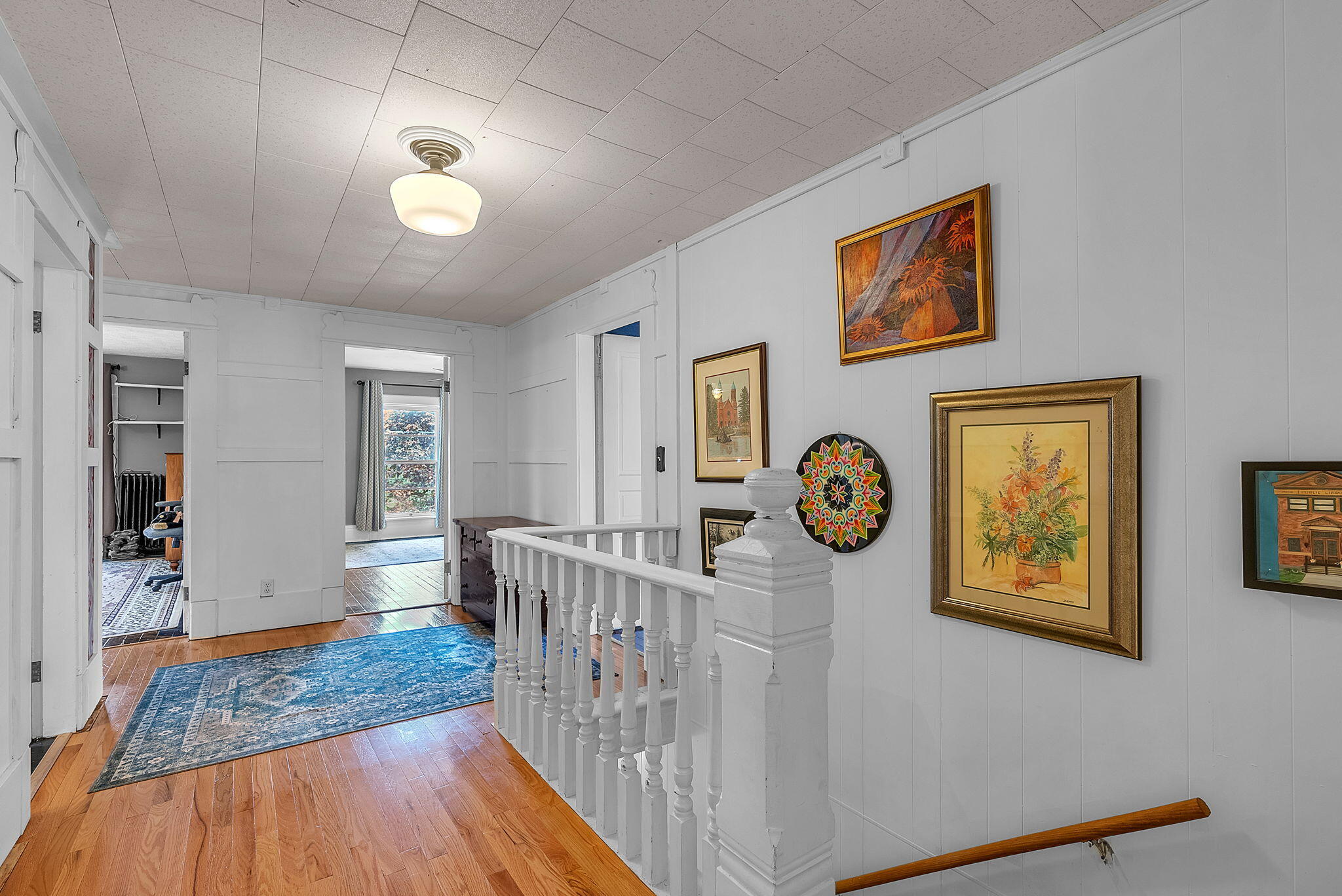 623 West Milroy Avenue Rensselaer, IN 47978 - Photo 29 of 64 a view of a hallway with wooden floor and windows