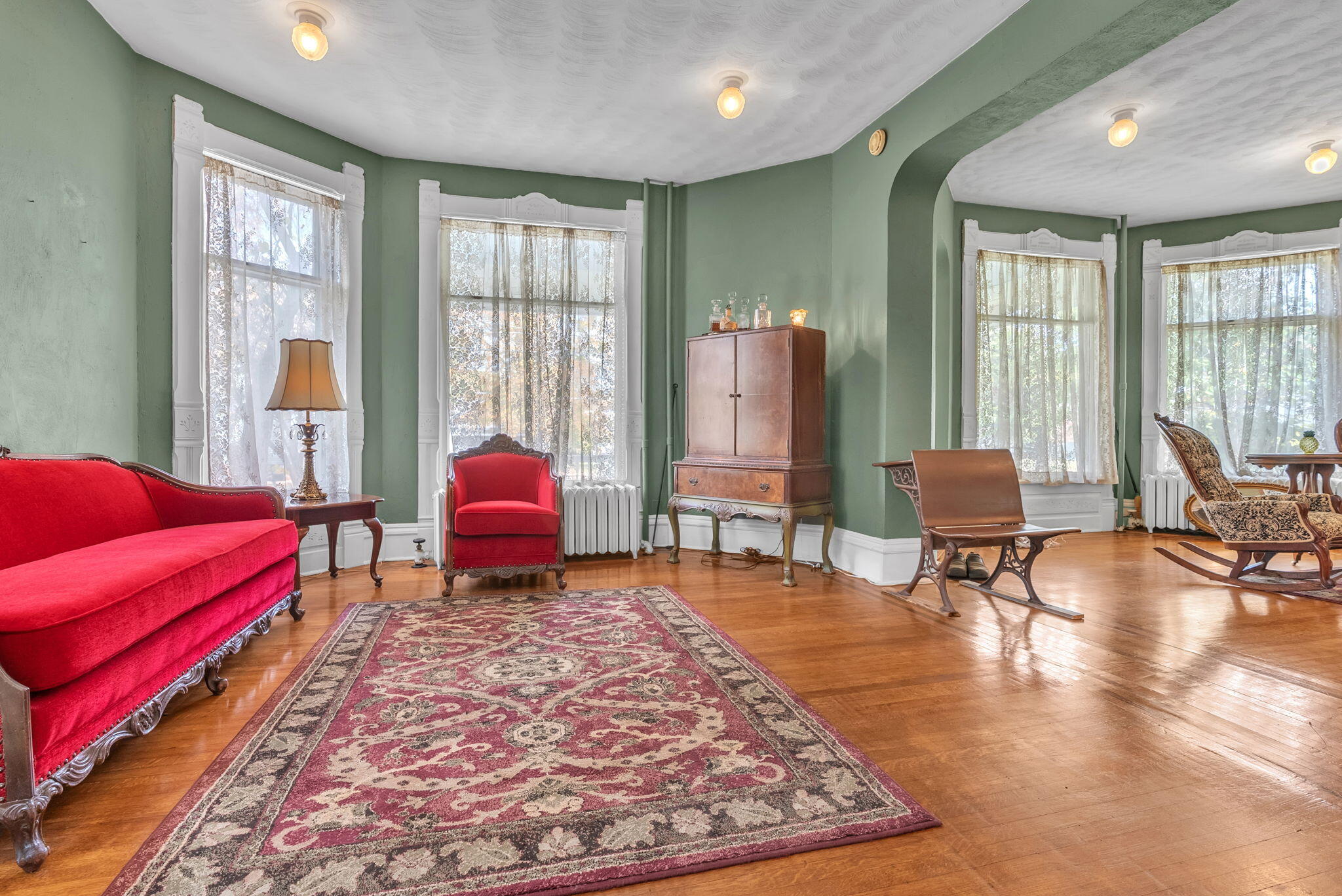 623 West Milroy Avenue Rensselaer, IN 47978 - Photo 10 of 58 a living room with furniture and a large window