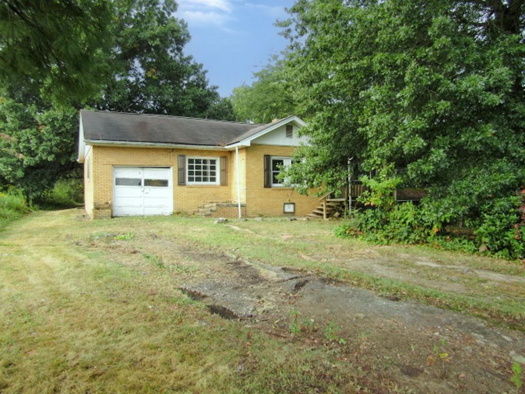 a view of outdoor space and yard