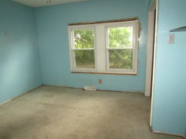 an empty room with a window