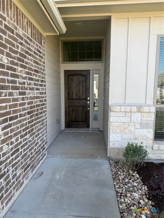 a view of front door of house and front door