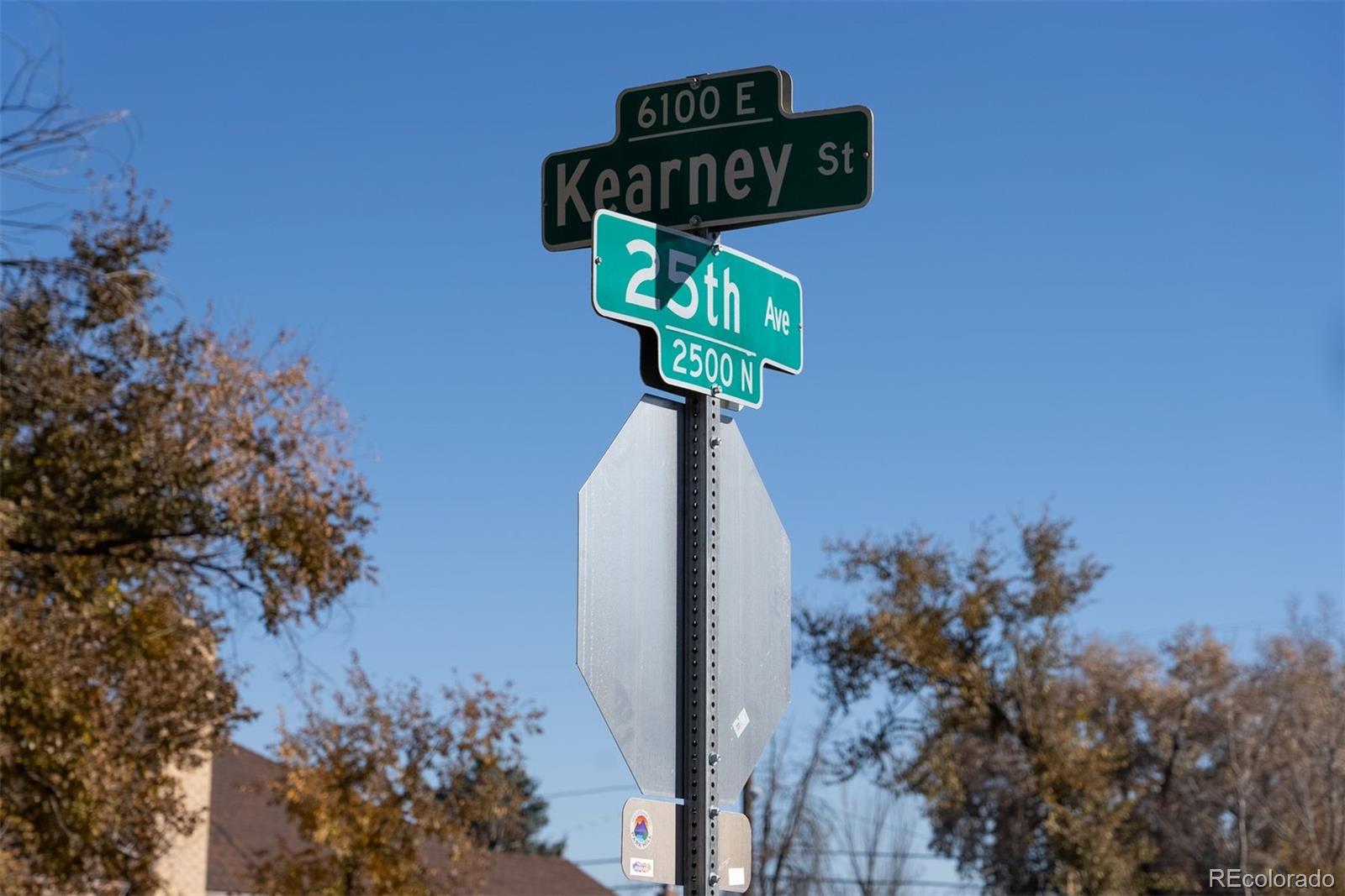 2500 Kearney Street Denver, CO 80207 - Photo 23 of 24 a street sign on a wall next to a road