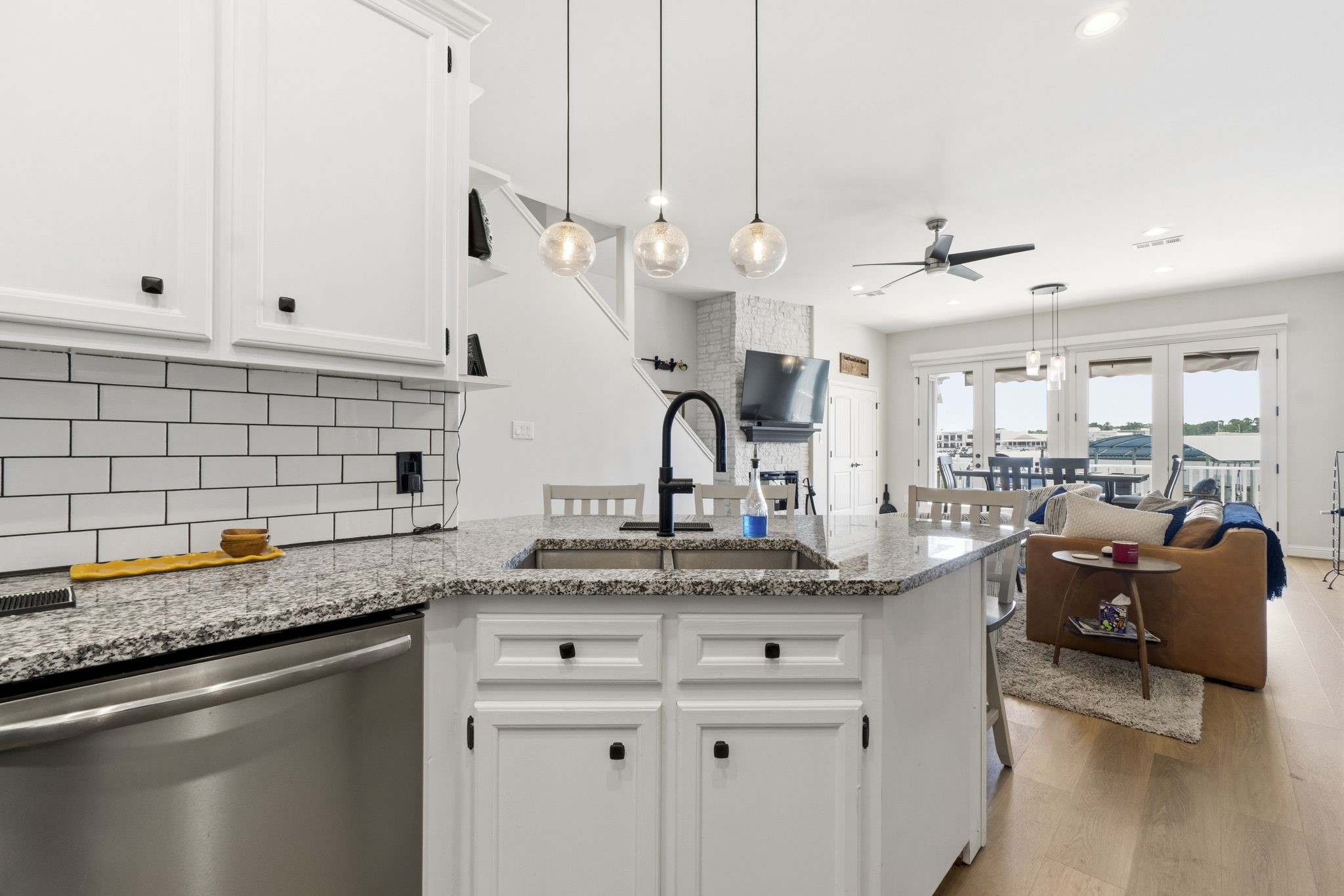 2 Key Harbour Conroe, TX 77356 - Photo 15 of 41 a kitchen with stainless steel appliances granite countertop a sink stove and cabinets