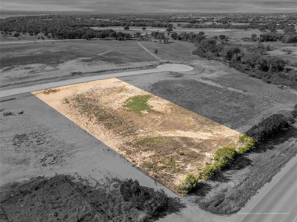 a view of a dry yard with wooden floor