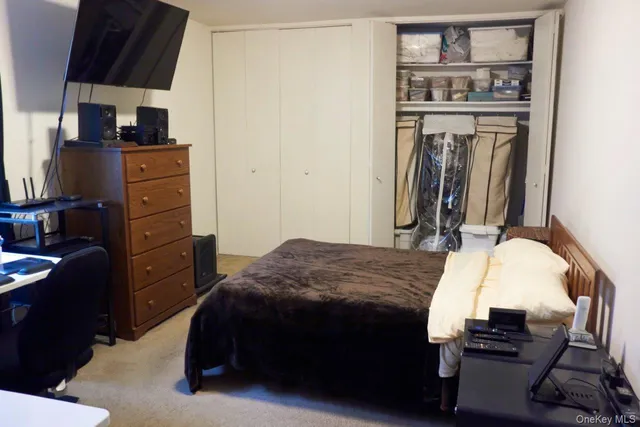 a desktop computer sitting on top of a desk and chair