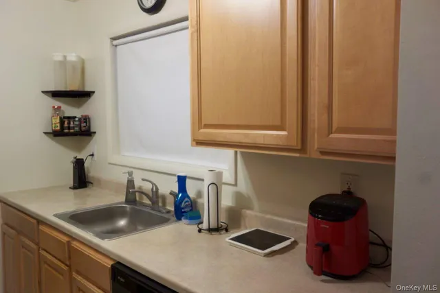 a workspace with furniture and book shelf