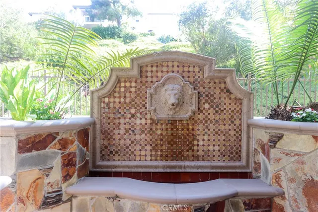 a view of a wooden door with chairs