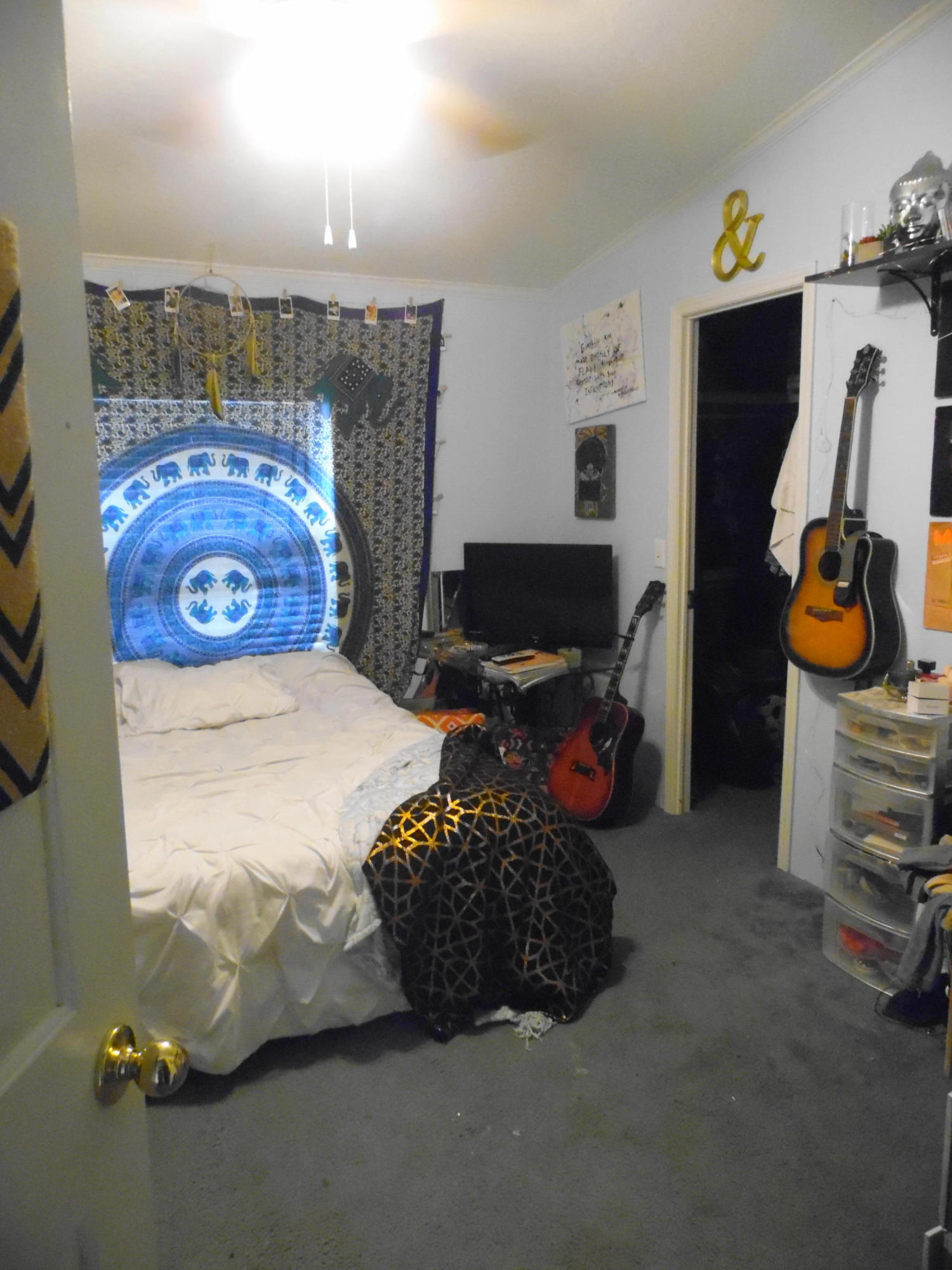 642 Elmwood Road DeFuniak Springs, FL 32433 - Photo 31 of 37 a bedroom with a bed and a tv