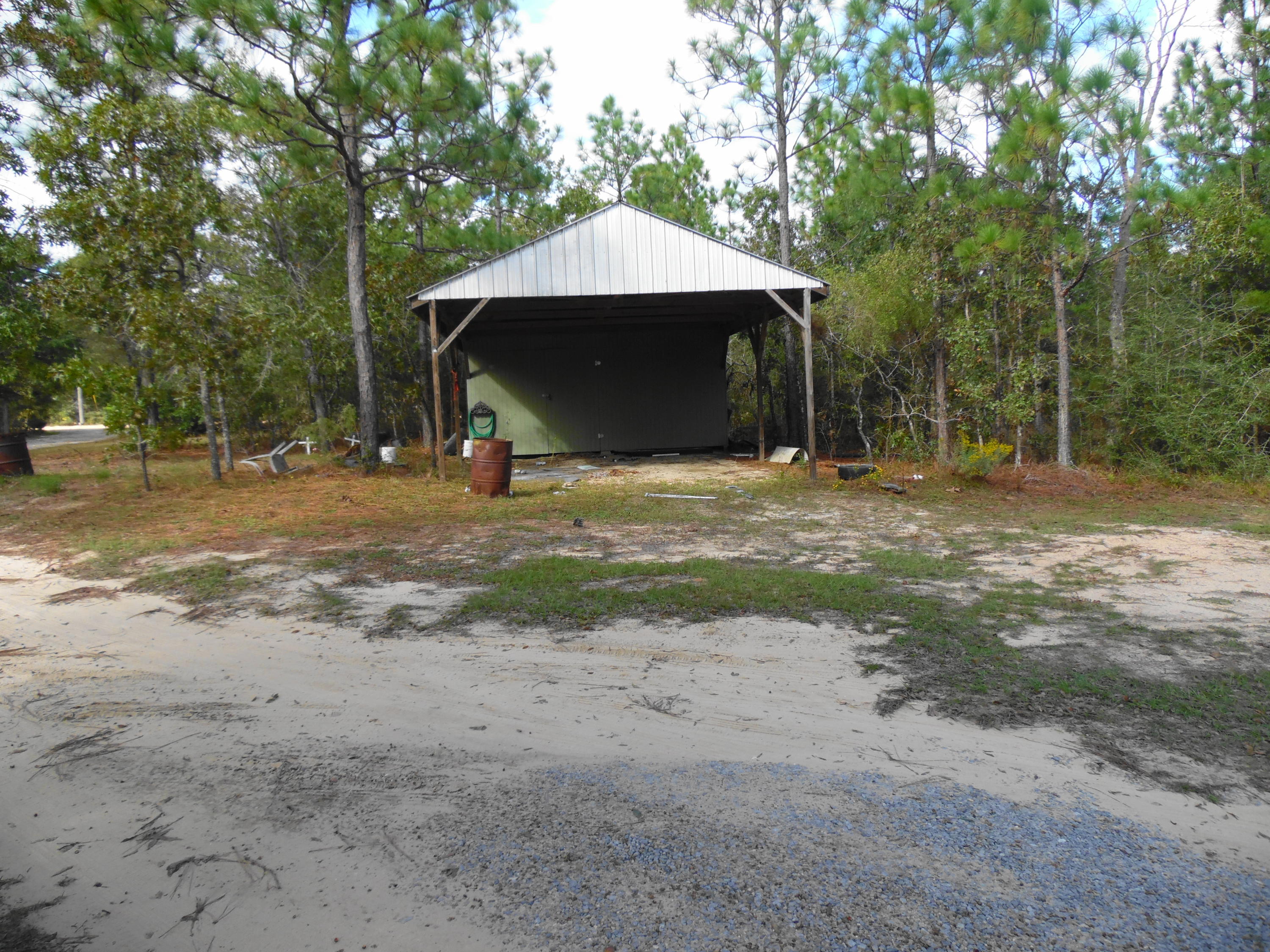 642 Elmwood Road DeFuniak Springs, FL 32433 - Photo 4 of 37 a view of a outdoor space with a house
