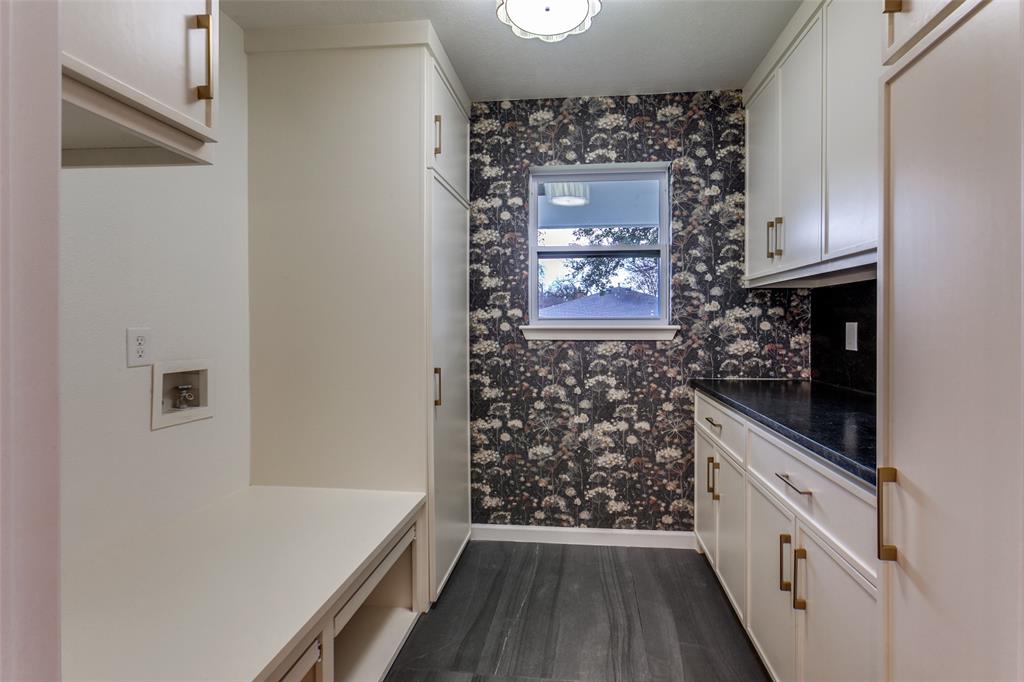 4371 Mill Creek Road Dallas, TX 75244 - Photo 14 of 33 a kitchen with granite countertop a sink and cabinets