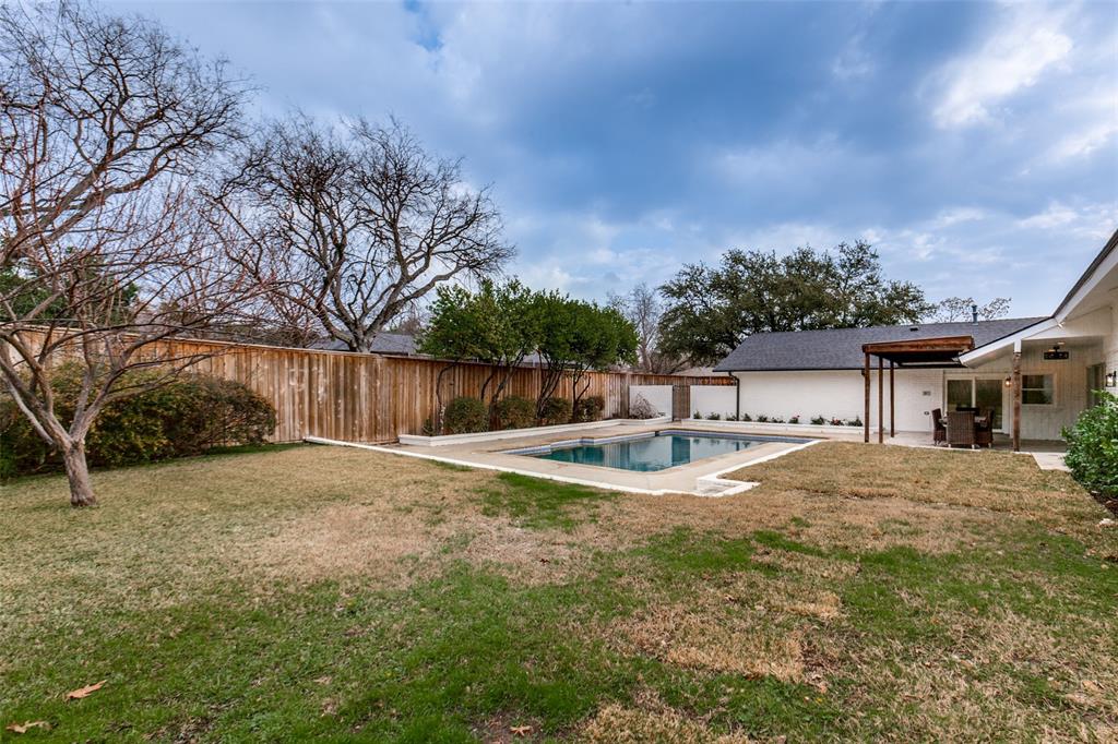 4371 Mill Creek Road Dallas, TX 75244 - Photo 26 of 33 a view of a backyard with a tree