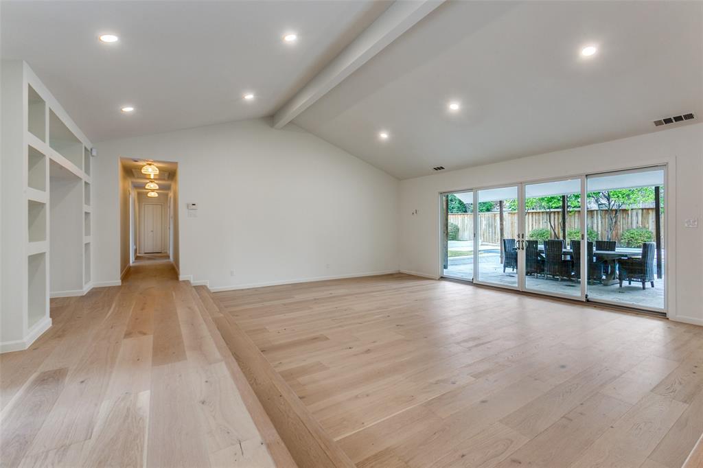 4371 Mill Creek Road Dallas, TX 75244 - Photo 3 of 33 a view of room and hall with wooden floor