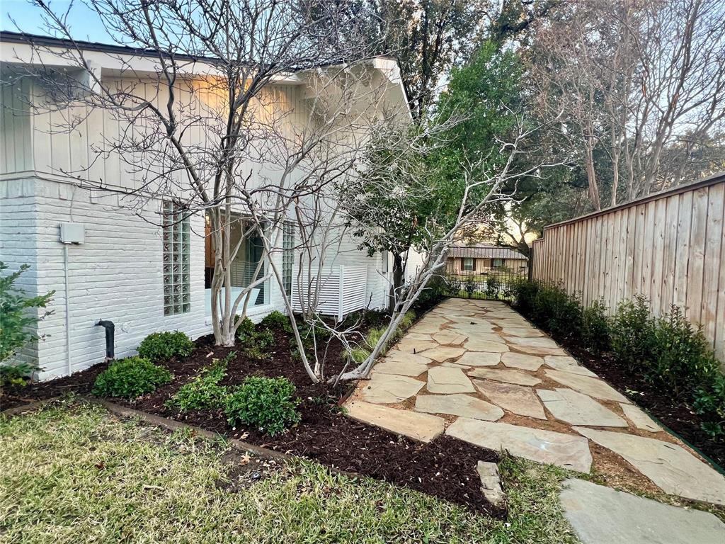 4371 Mill Creek Road Dallas, TX 75244 - Photo 32 of 33 a view of a backyard with pathway