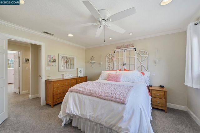 a view of a workspace with furniture and a living room