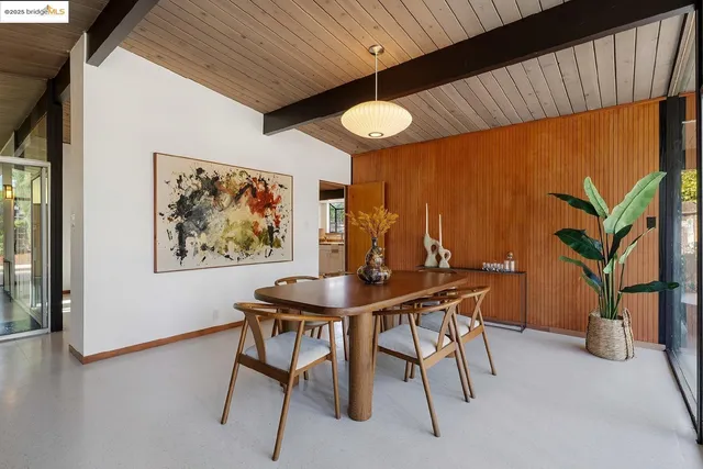a view of kitchen and dining room with furniture