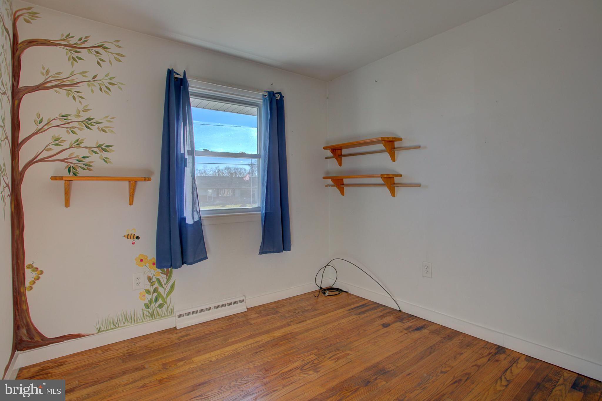 1047 Letort Road Conestoga, PA 17516 - Photo 20 of 30 wooden floor and window in a room