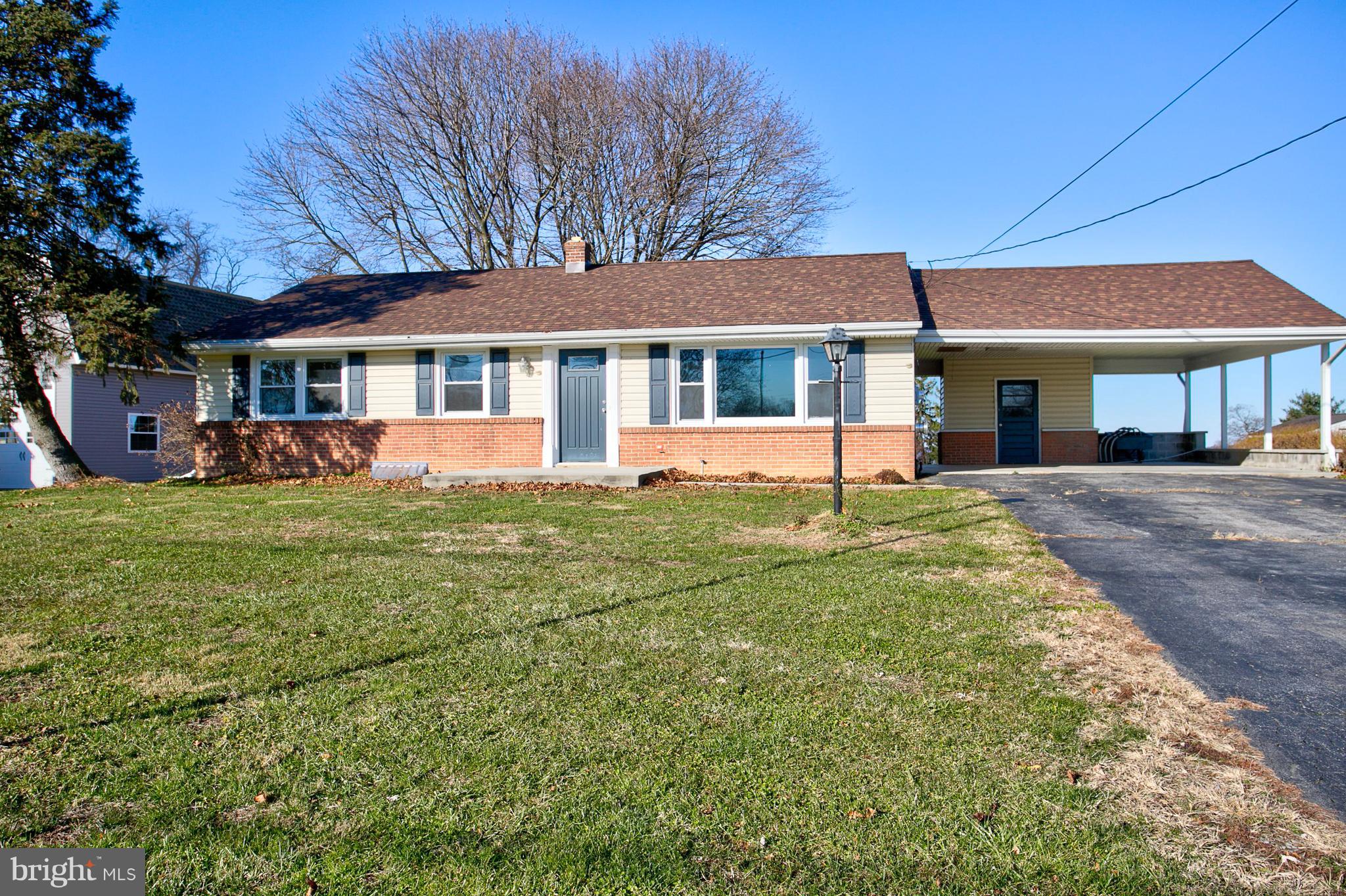 1047 Letort Road Conestoga, PA 17516 - Photo 3 of 30 a front view of a house with a yard