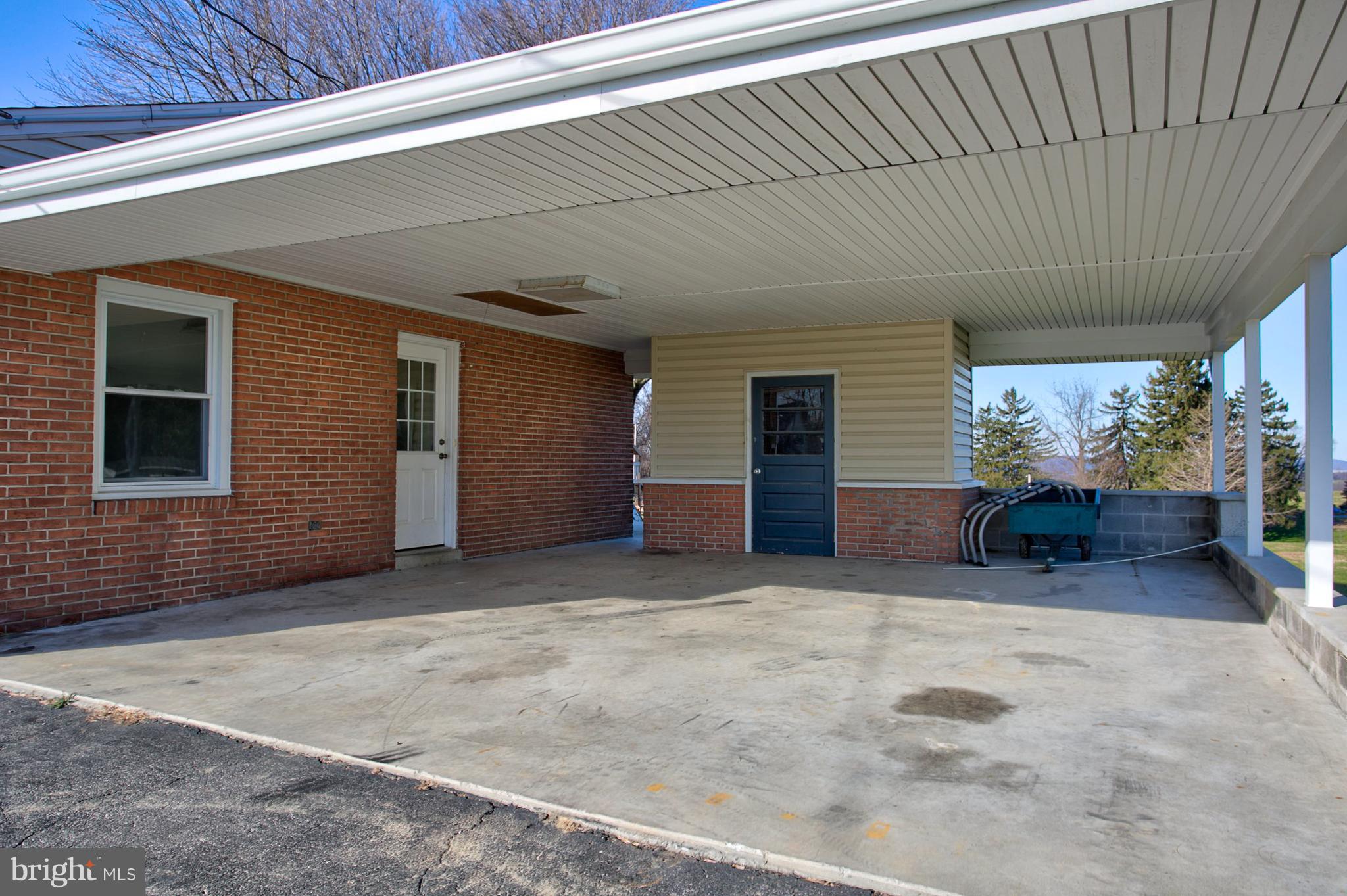 1047 Letort Road Conestoga, PA 17516 - Photo 29 of 30 a view of a house with a garage
