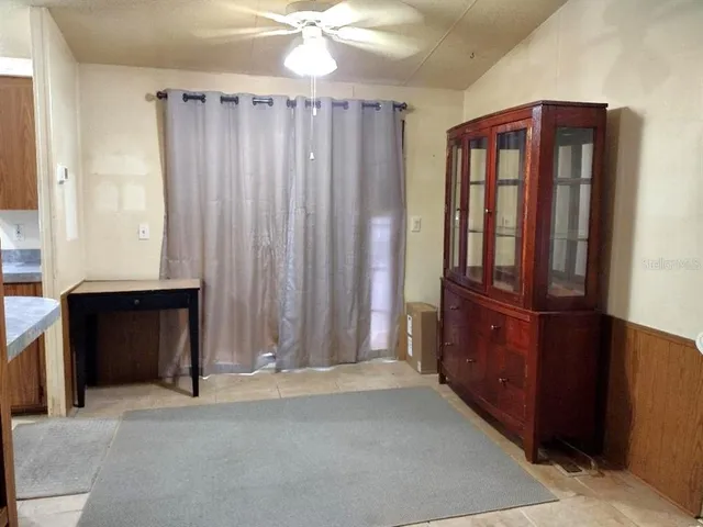 a view of a utility room with windows