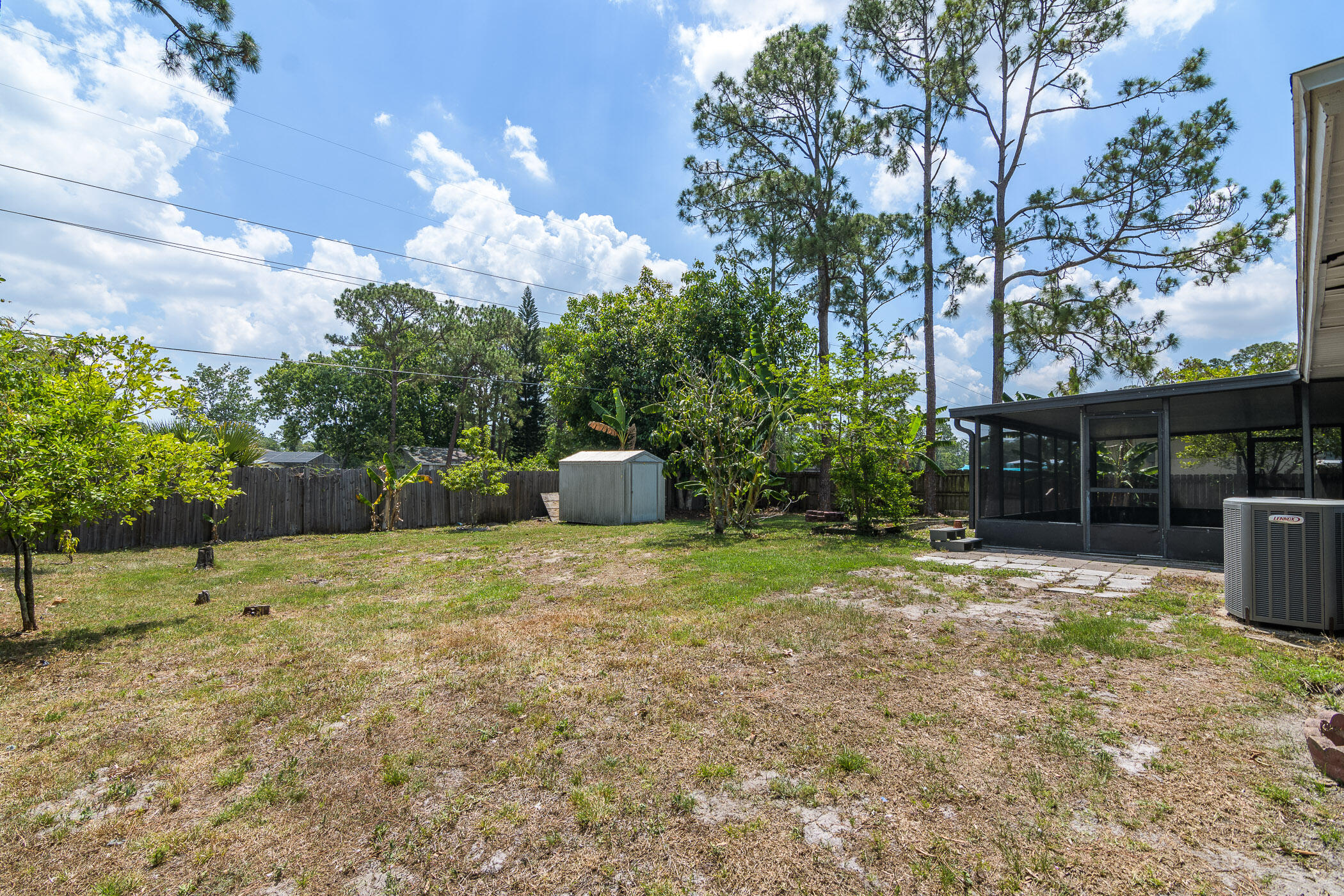 565 Town Road Southwest Palm Bay, FL 32908 - Photo 26 of 37 Fenced backyard