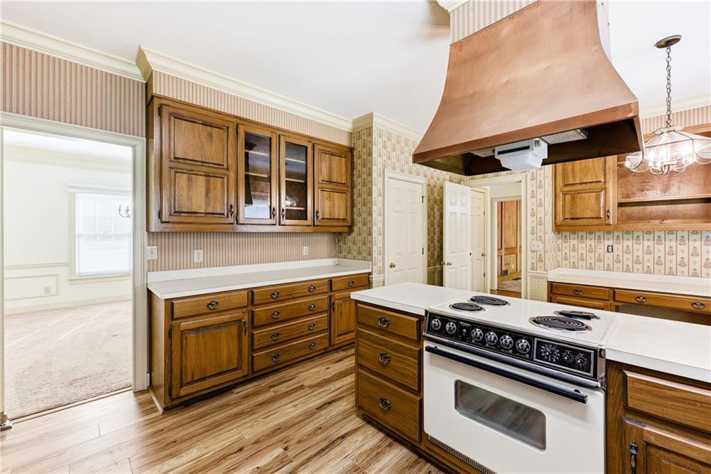 3608 Maple Forge Lane Gainesville, GA 30504 - Photo 11 of 45 a kitchen with a stove and a sink