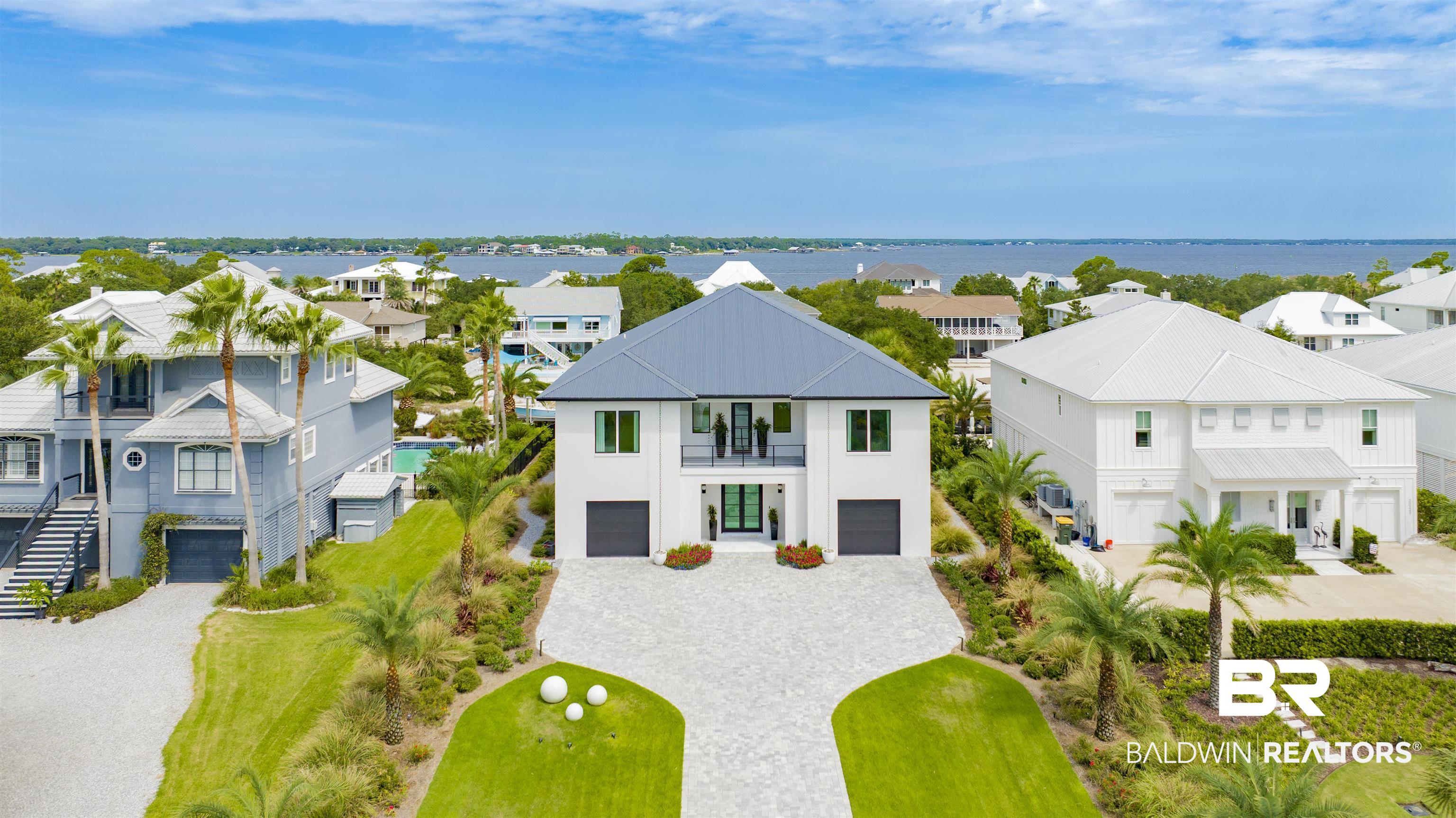 30239 Canal Court Orange Beach, AL 36561 - Photo 4 of 70 Aerial perspective of suburban area