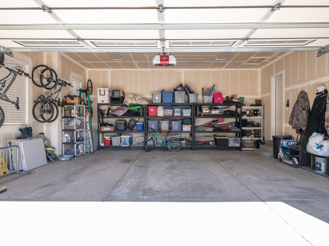 641 West 500 South Midway, UT 84049 - Photo 48 of 52 Spacious garage featuring a concrete floor, overhead garage door, and ample wall space