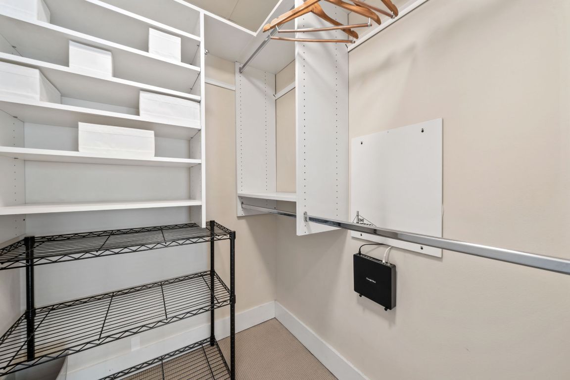 603 Davis Street, Unit 710 Austin, TX 78701 - Photo 11 of 37 a view of a room with rack on the wall