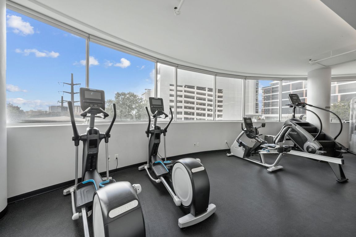 603 Davis Street, Unit 710 Austin, TX 78701 - Photo 26 of 37 a view of a room with gym equipment