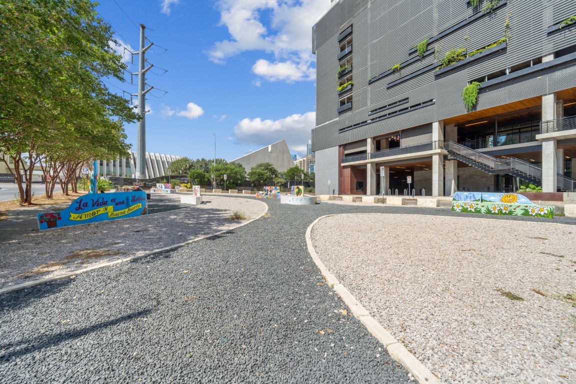 603 Davis Street, Unit 710 Austin, TX 78701 - Photo 31 of 37 a front view of a building with street