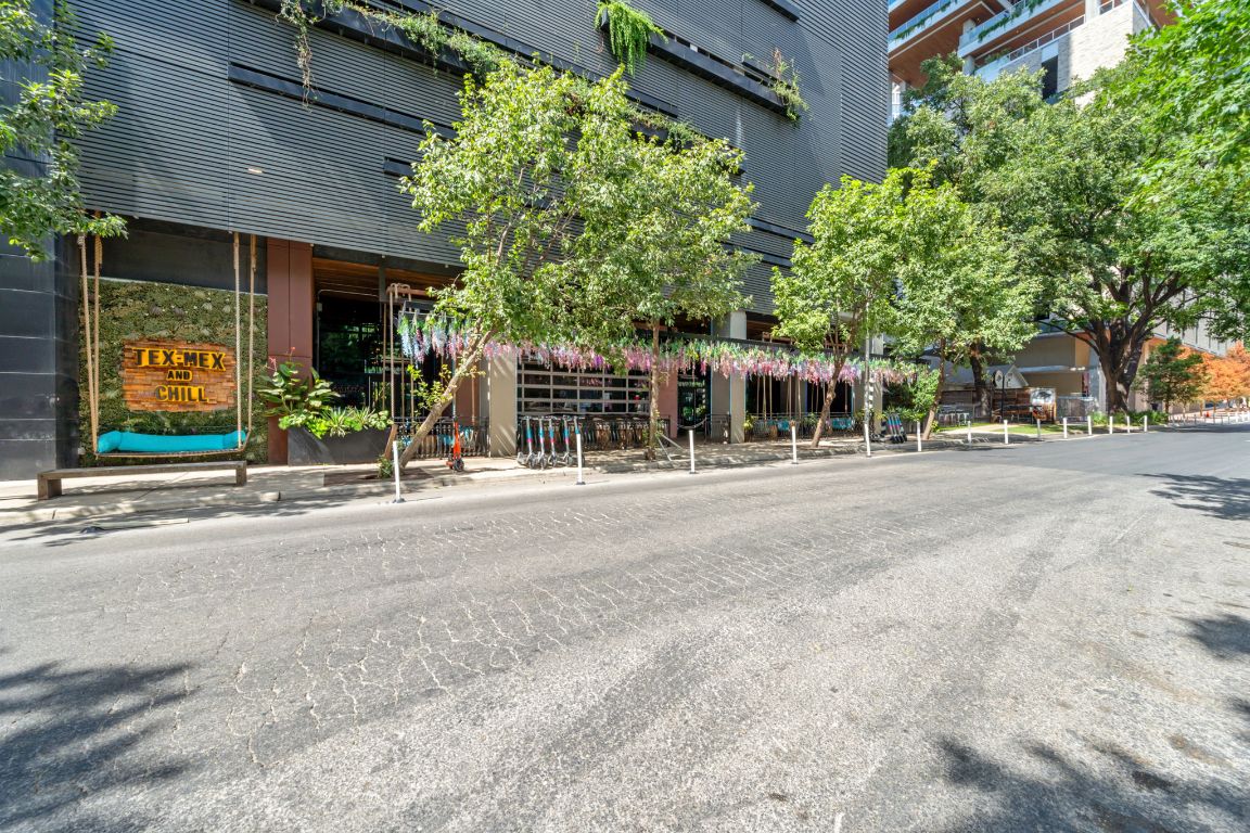 603 Davis Street, Unit 710 Austin, TX 78701 - Photo 32 of 37 front view of a building with street view