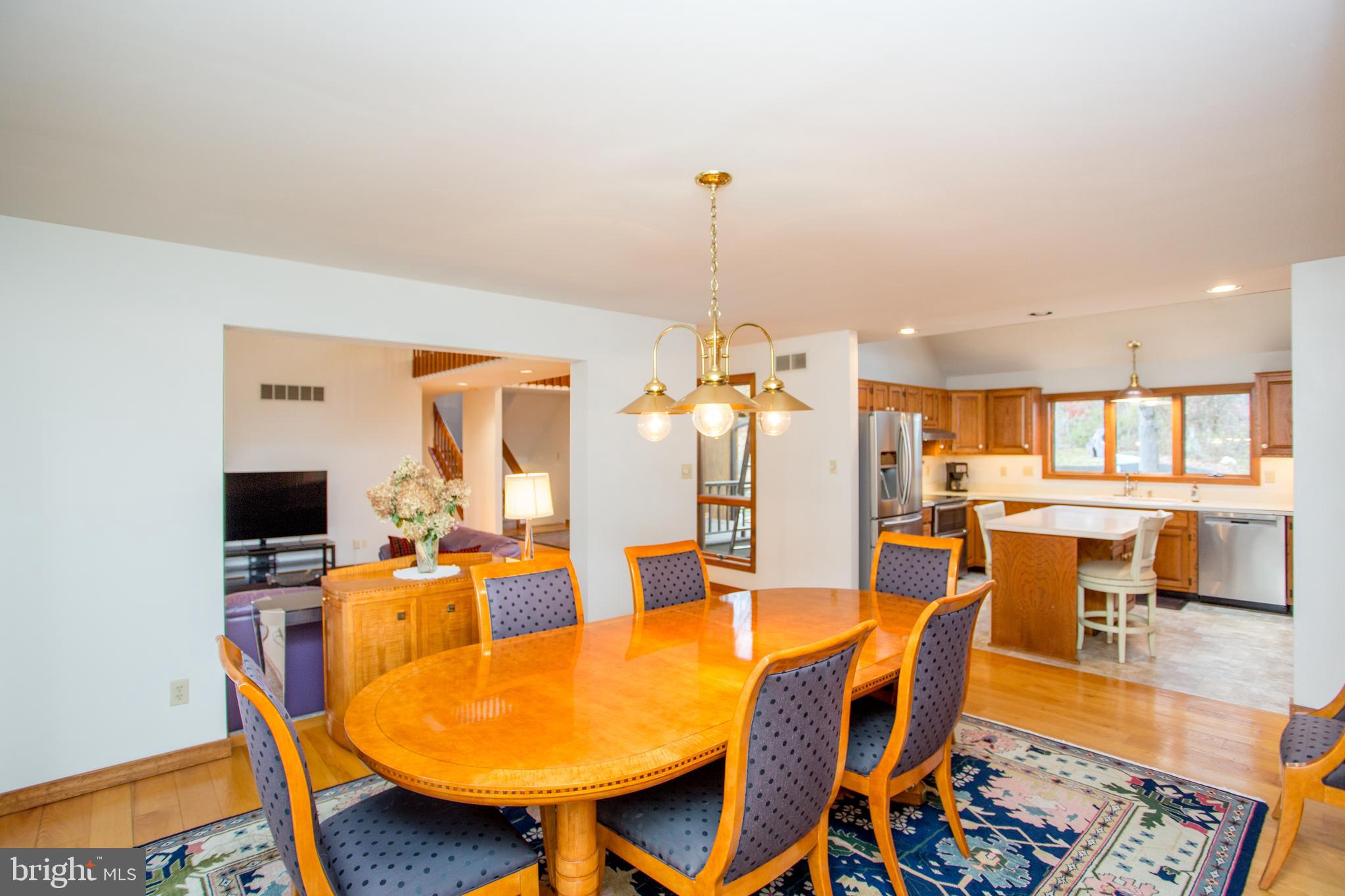 786 Ridge Road Telford, PA 18969 - Photo 33 of 105 a view of a dining room with furniture and wooden floor