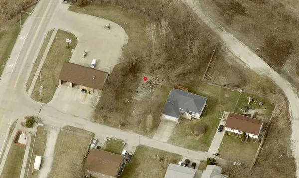 an aerial view of a highlighted house