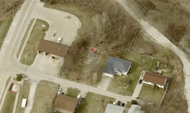 an aerial view of a highlighted house