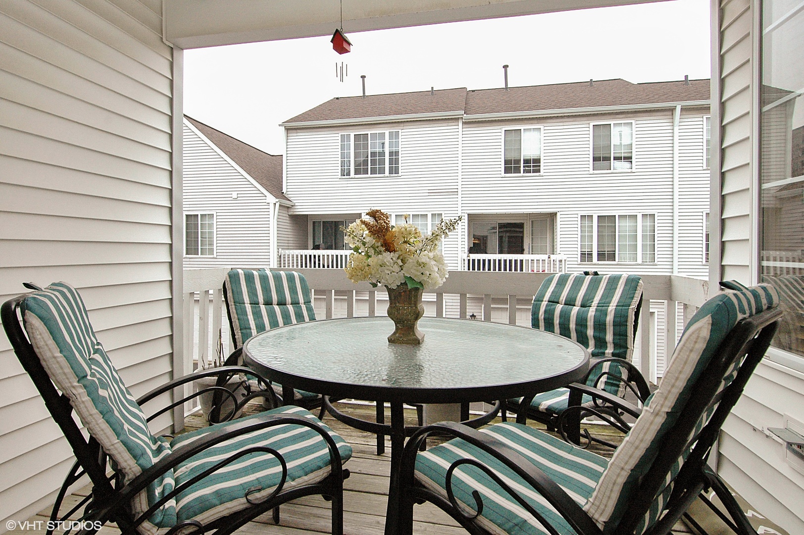 2237 Dawson Lane, Unit 2237 Algonquin, IL 60102 - Photo 12 of 14 a view of a dining room with furniture and wooden floor