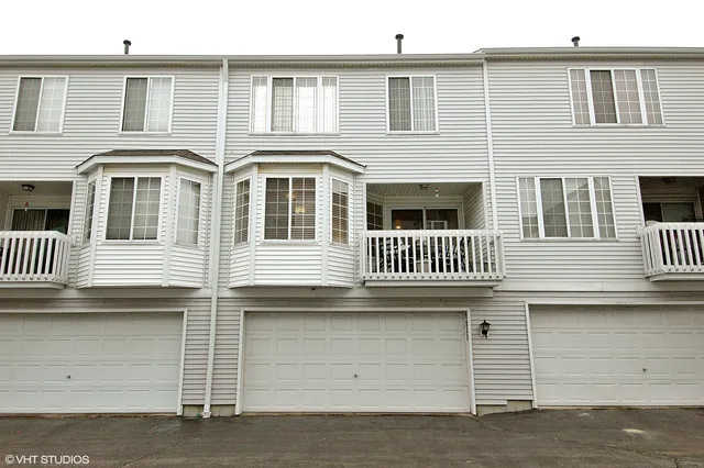 a front view of a house with stairs