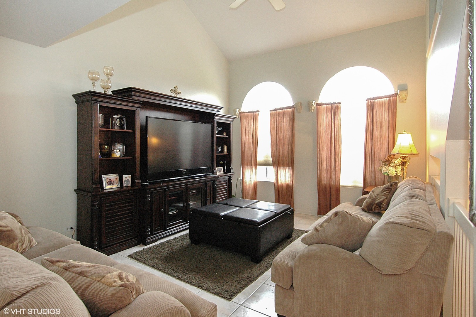2237 Dawson Lane, Unit 2237 Algonquin, IL 60102 - Photo 3 of 14 a living room with furniture and a flat screen tv