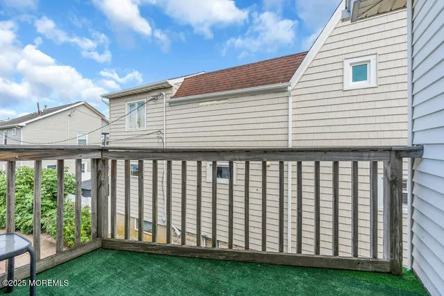 a roof deck with a yard